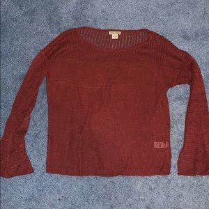 Red sweater flared sleeves